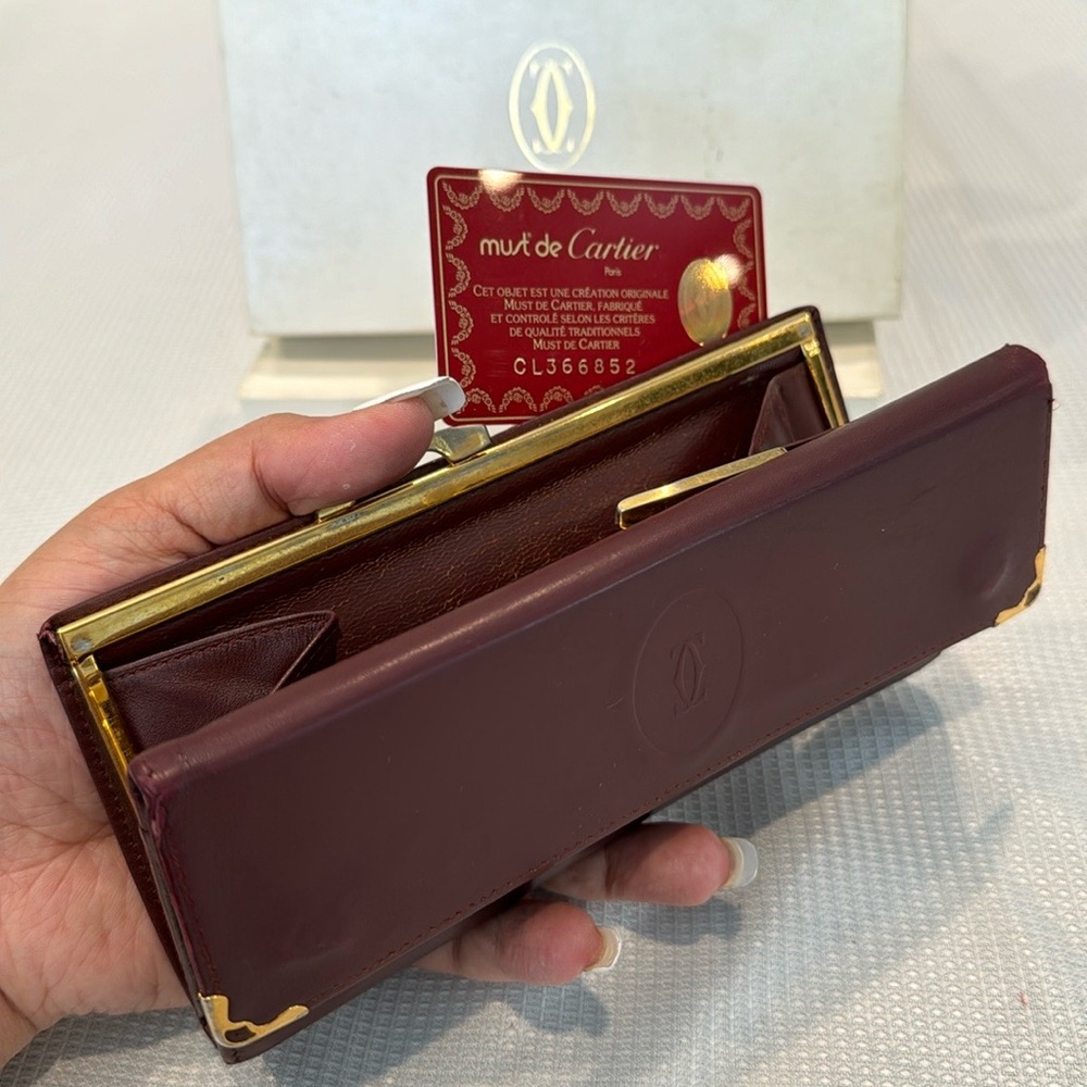 Authentic Cartier kisslock wallet with authenticity card and box